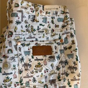 Free People x Wrangler White Denim High-Rise Jeans with Multicolor Summer Motifs